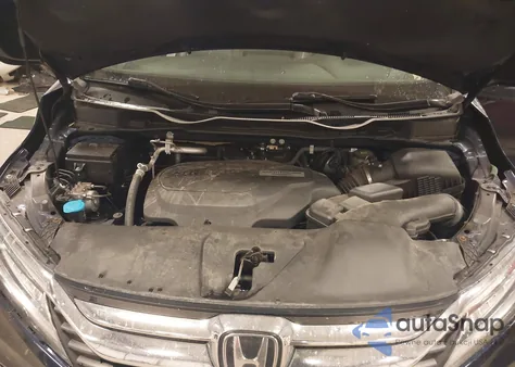 2019 Honda Odyssey Touring z USA, uszkodzony, nr VIN 5FNRL6H82KB027149